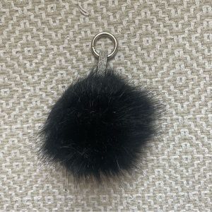 Large black pom pom bag charm keychain